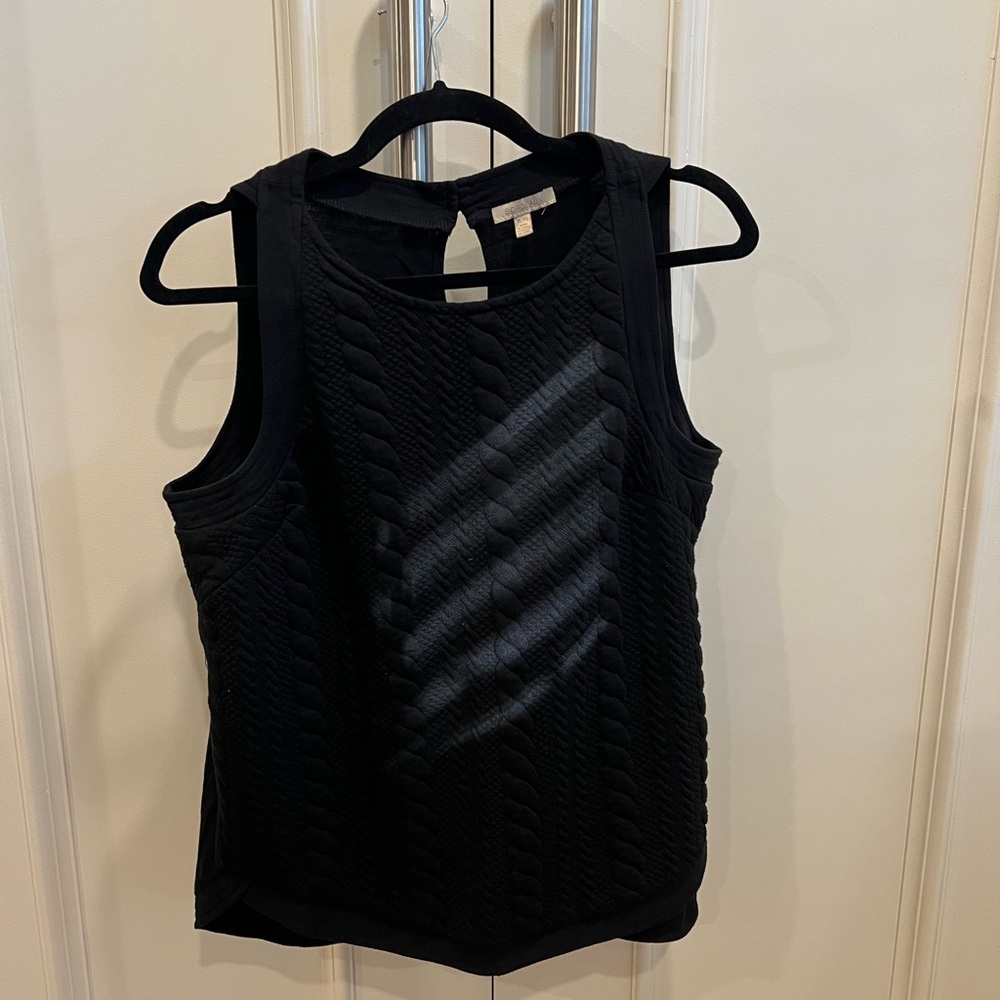 Flattering black tank with rope style front and plain back. Excellent condition.